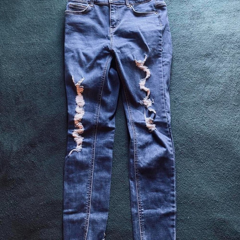 Super Distressed Denim Jeans